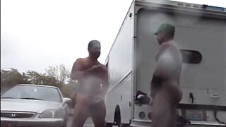 Public Rainy Stroking in a Parking Lot by Two Horny Men