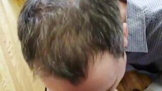 Amateur Takes On Two in a Group Blowjob